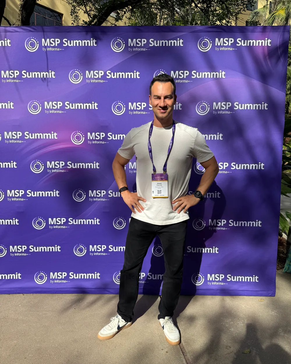 Alexej Pikovsky in front of the MSP Summit backdrop in Orlando